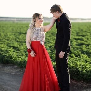Elegant Red Evening Gown with Embellished Bodice
